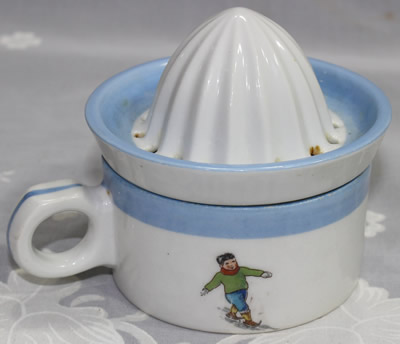 The skater on a Limoges skater, parachute and aeroplane 2 piece juicer