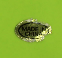 Foil label on a 2 piece lime green ceramic jug juicer