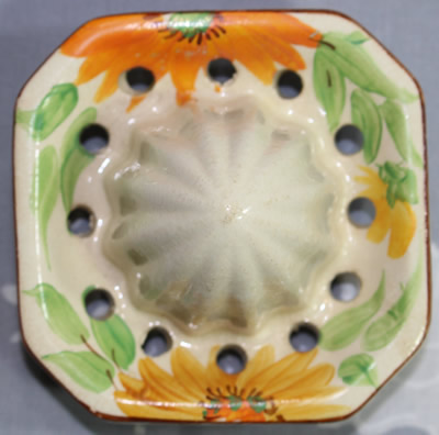 Reamer for a Sylvan Ware juicer with yellow and orange flowers juicer