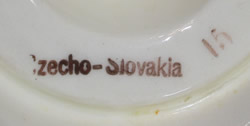 Basemark on a black trim on patterned white Czecho-Slovakia juicer 