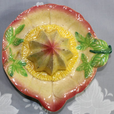 Reamer for a Japanese pink, yellow and green on cream juicer