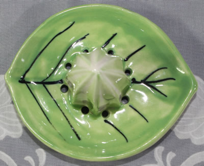 The reamer for a Lemon Juice bowl with green leaf juicer