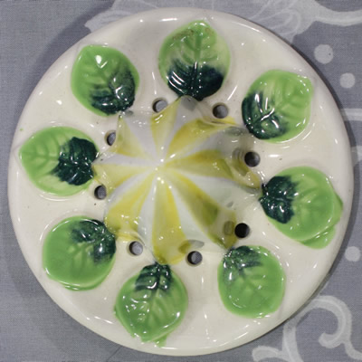 The reamer for a green leaves on beige Japanese 2 piece juicer