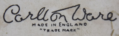 The basemark on a yellow 'peel' Carlton Ware juicer
