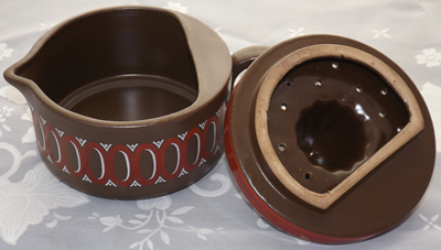 Brown, red & white ceramic juicer parts