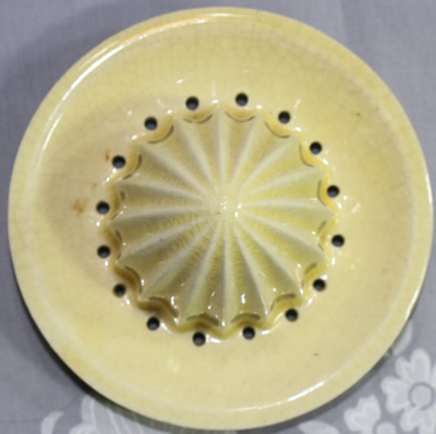 Reamer for a cream and green ceramic swan straight cone juicer