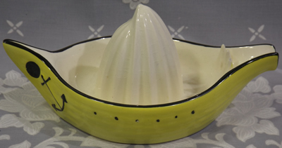 Back view of a yellow Beswick boat juicer