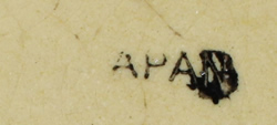 Partial basemark on lemons & leaves on ceramic juicer 