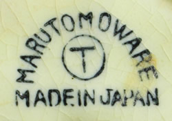 The basemark on a Marutomo Ware asparagus ceramic juicer 