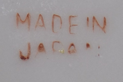The basemark on an orange bill & green wings lustre duck juicer