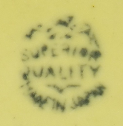 A Superior Quality basemark on a green trim on beige 2 piece juicer 