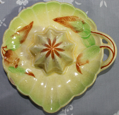 Top view of round gumnut ceramic saucer juicer