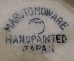 Marutomo juicer with orange & blue flower tab grip base mark