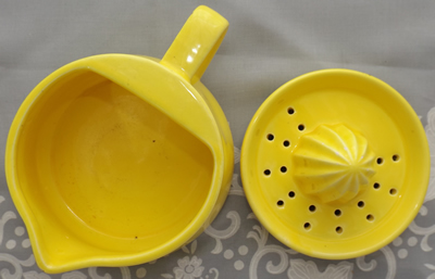 Showing the truncation for a yellow Japanese ceramic 2 piece juicer