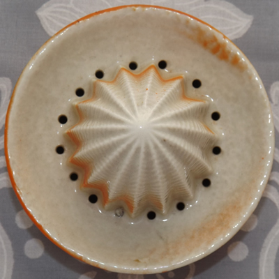 Reamer for an embossed flowers on an orange ceramic juicer