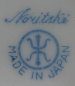 The basemark on a gold trim white Noritake juicer 