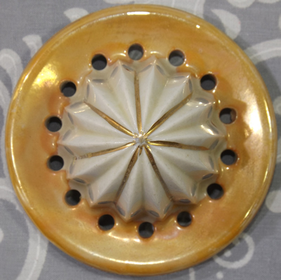 Flowers on blue and gold lustre jug with gold and white reamer