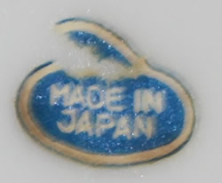 Sticker on an elongated bowl Japanese white porcelain juicer