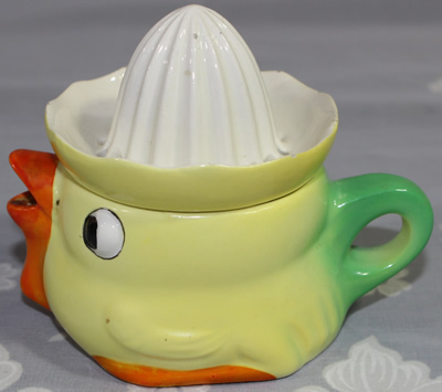 Side view of Goebel C.15 chicken 2 piece juicer 