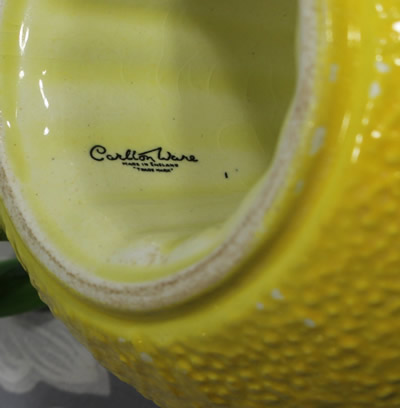 The basemark on a large yellow Carlton Ware 1 piece 'peel' juicer