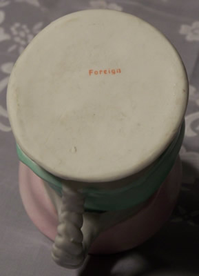 The base of pale green with pink hat 1 piece toby juicer
