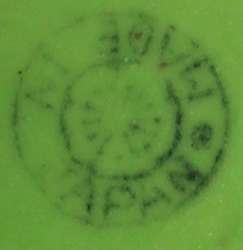 Base mark on squat green & white clown juicer 