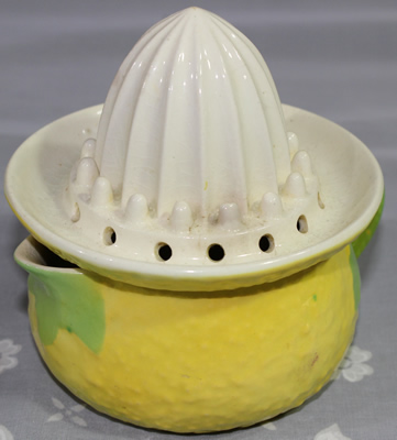 Front leaves on yellow 'peel' & white top Crown Devon juicer