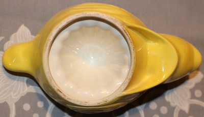 The base of a Beswick yellow and white duck 1 piece juicer 