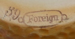 Basemark on an orange with green handle Czechoslovakian juicer