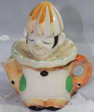Seiei & Co basemark on a brown, orange and white clown juicer