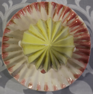 The reamer for a yellow clown tea pot juicer