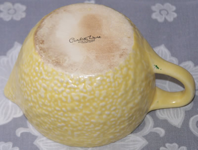Basemark on a pale yellow citrus peel Carlton Ware 2 piece juicer