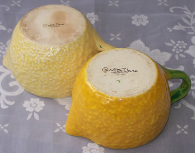 Compare the colours of 2 different yellow citrus peel Carlton Ware 2 piece juicers