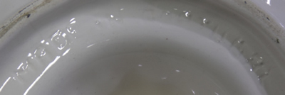 Impressed mark on white fish juicer