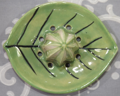 The reamer for an Orange Juice bowl with green leaf juicer