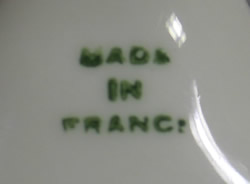 The base mark on a Limoges childs pudding bucket flower pot juicer