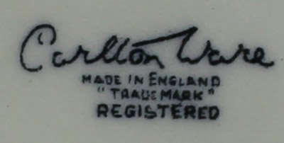 The 2 parts of a Carlton Ware grapefruit plate with juicer