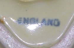 Base mark on pale green English strainer juicer