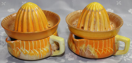 Two other examples of the orange Shelley scratched drip glaze juicers
