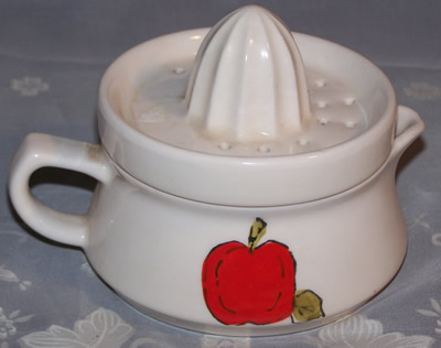 Back of pear & apple on white 2 piece juicer