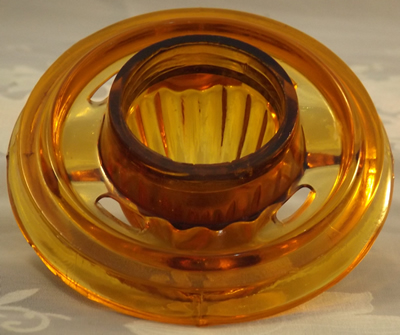 Bottom view of juicer top