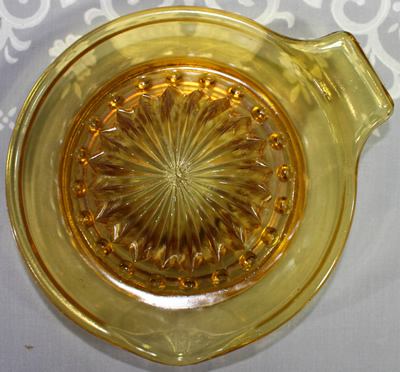 Top view of large cone amber glass juice