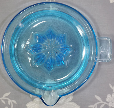 Barnes blue glass saucer juicer top view