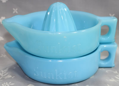 2 different shades of blue milk glass SUNKIST juicers