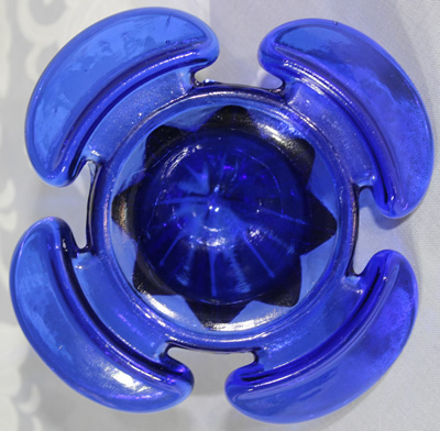 Bottom view of a cloverleaf shaped cobalt blue juicer