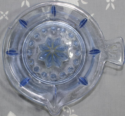 Top view of a "Czechoslovakia" on a blue 1 piece glass juicer