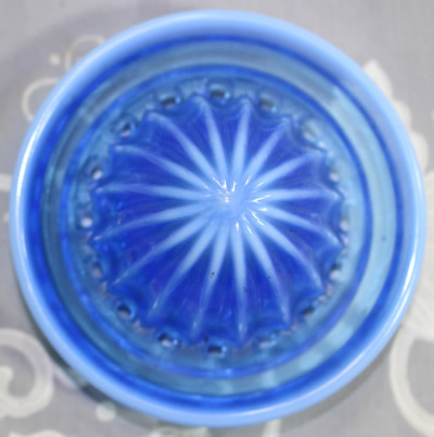 The reamer for a frosted blue glass Edna Barnes 2 piece juicer