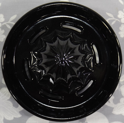 Reamer for Black glass juicer embossed with a lemon and an orange