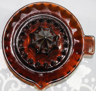 Top view of a brown glass panelled juicer