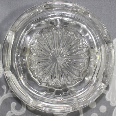 The reamer for a Crown Crystal (Australia) 2 piece clear glass juicer
